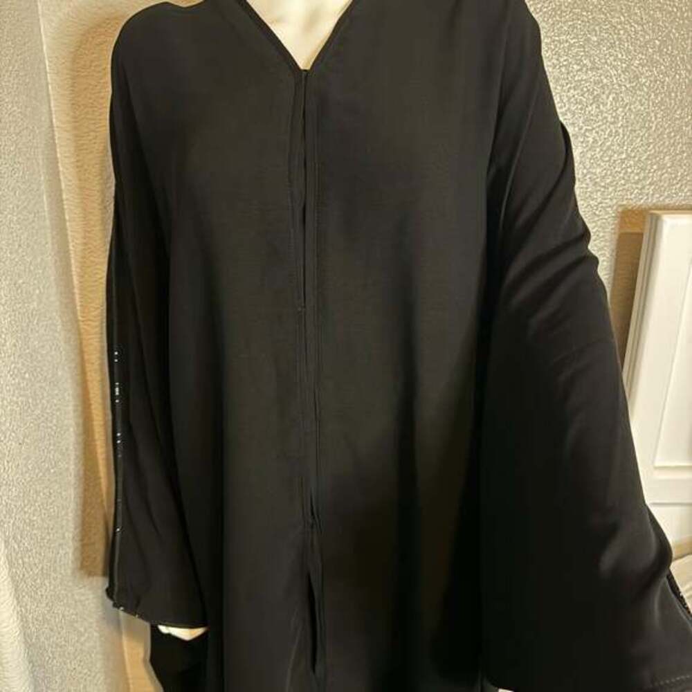Black Abaya with Beadwork
Comes with hijab and niqab